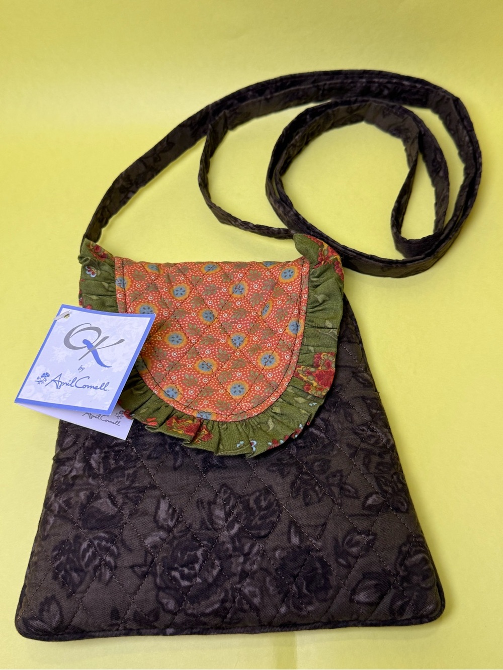 April Cornell Black Quilted Crossbody with Orange Floral Flap and Green Trim
